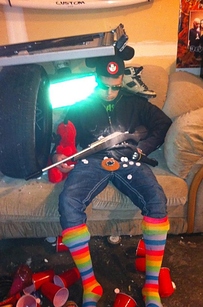 8. The guy with the rainbow brite socks and Mickey Mouse hat.