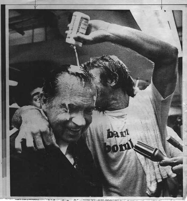 Richard Nixon has a beer poured on his head by Bobby Grich after the LA Angeles win their division title.